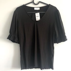 Bohme - Size L black ruffle hem knit top